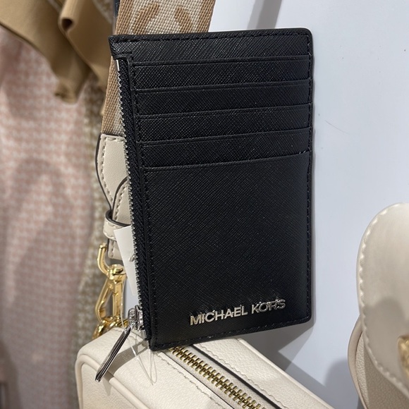 MICHAEL KORS
Jet Set Travel Medium Top Zip Leather Card Case Wallet 
Black 
NWT - Picture 4 of 16